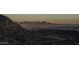 Panoramic view of city lights and mountain range at sunset at 13767 N Prospect Trl, Fountain Hills, AZ 85268