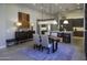 Modern dining area with a stylish chandelier and kitchen access at 13767 N Prospect Trl, Fountain Hills, AZ 85268