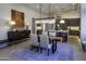 Modern dining area with a stylish chandelier and kitchen access at 13767 N Prospect Trl, Fountain Hills, AZ 85268