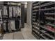 Large walk-in closet with custom shelving and drawers at 13767 N Prospect Trl, Fountain Hills, AZ 85268