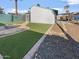 Updated home with a large backyard, firepit, and artificial turf at 1433 E Kerry Ln, Phoenix, AZ 85024