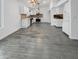 Modern kitchen with white cabinets and gray tile floors at 1433 E Kerry Ln, Phoenix, AZ 85024