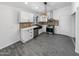 Modern kitchen with white cabinets and stainless steel appliances at 1433 E Kerry Ln, Phoenix, AZ 85024