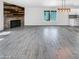 Bright living room with hardwood floors and a fireplace at 1433 E Kerry Ln, Phoenix, AZ 85024