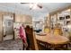 Dining room with wooden table and built-in hutch at 1471 E 22Nd Ave, Apache Junction, AZ 85119