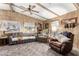 Living room with wood paneling and reclining chair at 1471 E 22Nd Ave, Apache Junction, AZ 85119