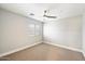 Simple bedroom with ceiling fan and window at 15550 N Frank Looyd Wright Blvd # 1057, Scottsdale, AZ 85260