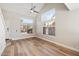 Light and airy living room with hardwood floors and large windows at 15550 N Frank Looyd Wright Blvd # 1057, Scottsdale, AZ 85260