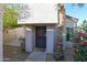 Condo entryway with a welcoming door and small garden at 16644 N 33Rd St # 105, Phoenix, AZ 85032