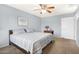 Spacious bedroom with ceiling fan and lots of natural light at 17027 N 95Th Dr, Sun City, AZ 85373