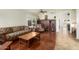 Living room with hardwood floors, and built-in shelving at 17713 N Larkspur Ln, Surprise, AZ 85374