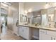 Double vanity bathroom with granite countertop at 18265 N 116Th Dr, Surprise, AZ 85378