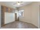 Bright bedroom with built-in cabinets and ceiling fan at 18265 N 116Th Dr, Surprise, AZ 85378