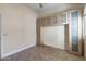 Bedroom with built-in cabinets and tile flooring at 18265 N 116Th Dr, Surprise, AZ 85378