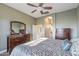 Spacious bedroom with large dresser and backyard view at 18265 N 116Th Dr, Surprise, AZ 85378