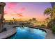 Relaxing kidney-shaped pool with stunning sunset views at 18265 N 116Th Dr, Surprise, AZ 85378