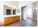 Bathroom boasts double sinks and a mirrored closet at 1964 S Marble St, Gilbert, AZ 85295