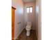 Small bathroom with toilet and wood-look floors at 1964 S Marble St, Gilbert, AZ 85295