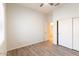 Bedroom with double door closet and window at 1964 S Marble St, Gilbert, AZ 85295