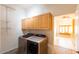 Laundry room with washer, dryer, and built-in cabinets at 1964 S Marble St, Gilbert, AZ 85295