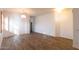 Open living room with hardwood floors and neutral color palette at 1964 S Marble St, Gilbert, AZ 85295