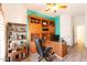 Home office with built-in wooden desk and shelving unit at 1964 S Marble St, Gilbert, AZ 85295