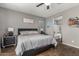 Main bedroom with en-suite bathroom and a view of the backyard at 19919 W Lincoln St, Buckeye, AZ 85326