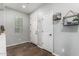 Inviting entryway with tile flooring and coat closet at 19919 W Lincoln St, Buckeye, AZ 85326