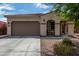 One-story home with a two-car garage and inviting front porch at 19919 W Lincoln St, Buckeye, AZ 85326