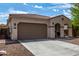 One-story home with a two-car garage and arched entryway at 19919 W Lincoln St, Buckeye, AZ 85326