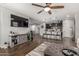 Open concept living room with kitchen view and hardwood floors at 19919 W Lincoln St, Buckeye, AZ 85326