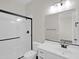 Clean bathroom with white vanity and frameless shower at 2091 E Geronimo St, Chandler, AZ 85225