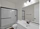 Modern bathroom with white vanity and shower at 2091 E Geronimo St, Chandler, AZ 85225