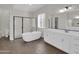 Double vanity bathroom with soaking tub and walk-in shower at 2091 E Geronimo St, Chandler, AZ 85225