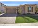 Two-car garage and paver driveway leading to the house entrance at 2091 E Geronimo St, Chandler, AZ 85225