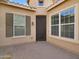 Inviting front entry with decorative iron gate and pavers at 2091 E Geronimo St, Chandler, AZ 85225