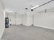 Bright and spacious garage with ample storage shelving at 2091 E Geronimo St, Chandler, AZ 85225