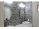 Elegant bathroom with gray tile, double vanity, and large mirrors at 23306 N 40Th Pl, Phoenix, AZ 85050