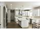 Modern kitchen featuring white cabinets, quartz countertops, and stainless steel appliances at 23306 N 40Th Pl, Phoenix, AZ 85050