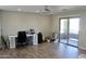 Home office with desk, chair, and access to a balcony at 23306 N 40Th Pl, Phoenix, AZ 85050