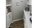 Bright walk-in pantry with ample shelving and white cabinets at 23306 N 40Th Pl, Phoenix, AZ 85050