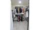 Spacious walk-in closet with double hanging rods and shelves at 23306 N 40Th Pl, Phoenix, AZ 85050