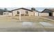 View of the home from the sidewalk, showing the front yard and entryway at 2348 W Laurel Ln, Phoenix, AZ 85029