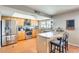 Galley kitchen with stainless steel appliances and light wood cabinets at 3343 E Anderson Dr, Phoenix, AZ 85032