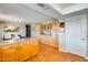 Kitchen features ample cabinetry, a breakfast bar, and terracotta tile flooring at 3343 E Anderson Dr, Phoenix, AZ 85032