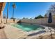 Relaxing kidney-shaped pool with surrounding patio at 3343 E Anderson Dr, Phoenix, AZ 85032