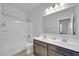 Bathroom with double vanity and a shower/tub combo at 36085 W Prado St, Maricopa, AZ 85138