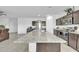 Kitchen island with granite countertop and double sink at 36085 W Prado St, Maricopa, AZ 85138