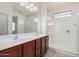 Double vanity bathroom with a large walk-in shower at 3667 S 185Th Dr, Goodyear, AZ 85338