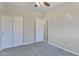 Bedroom with double doors and grey carpet at 3730 N Maya Rd, Eloy, AZ 85131